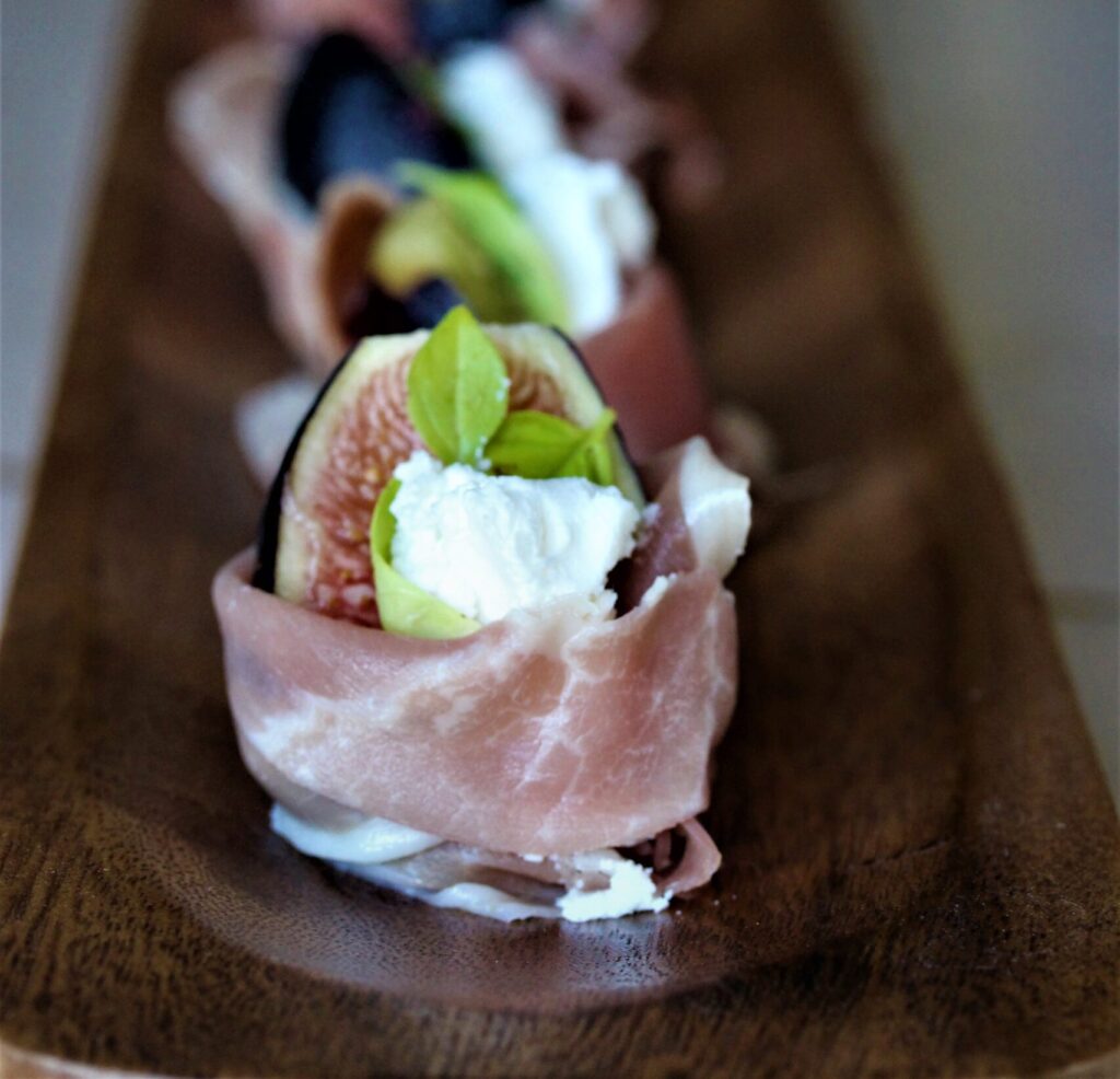 Prosciutto Wrapped Fig with Goat Cheese and Basil