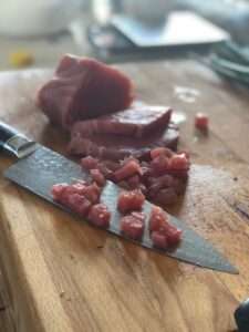 use a sharp knife to cut sushi